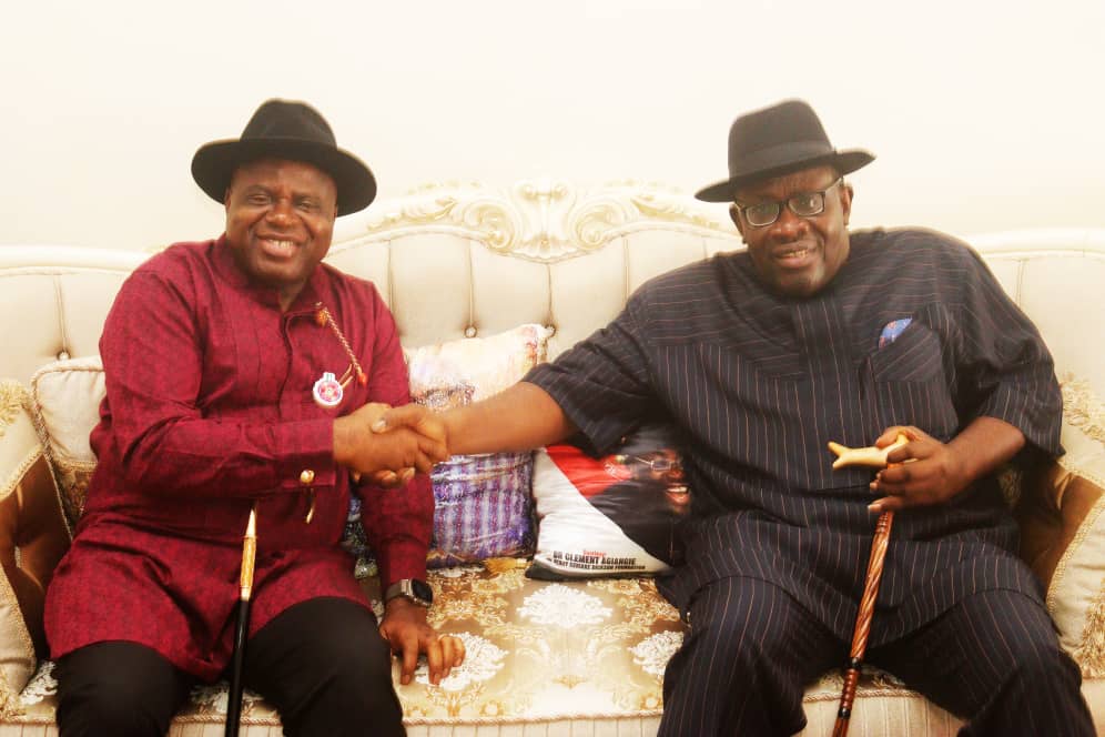 Governor Diri in an amiable handshake with his predecessor 